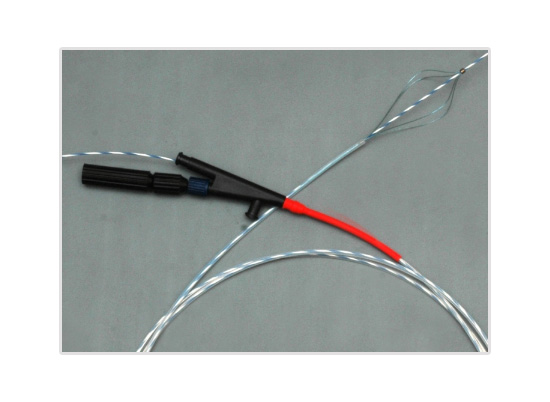 WIRE GUIDED MONOFILAMENT MEMORY BASKET